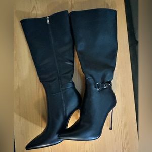 Knee high heeled boots